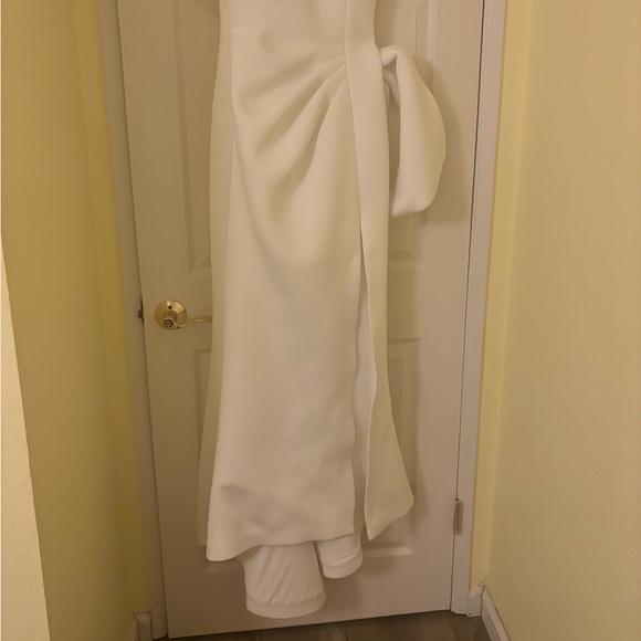 Jovani size 8 Strapless white gown with slit, side bow, and small tail. - Picture 3 of 10